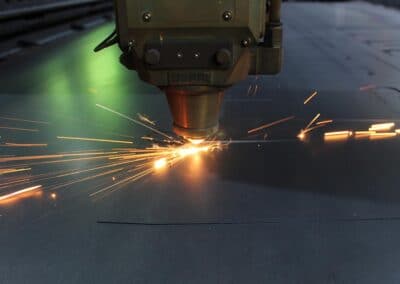 Image of a laser cutting on the production line at Slanetrac